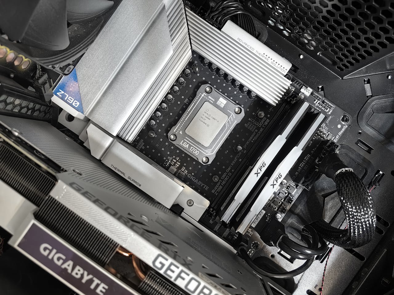 Crafting Captivating Headlines: Your awesome post title goes here Interior view of a high-performance PC build featuring a Gigabyte motherboard and components.